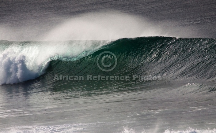 Wave Curling as it Breaks